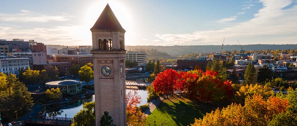 Wheatland Bank Still Living At Home - Spokane Riverfront Park skyline with clocktower